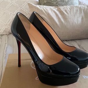 Louboutin black patent pumps , size 10.5 US/40.5 EU. Like-new.